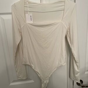 ReoRia Cream Long Sleeve Asymmetrical Bodysuit